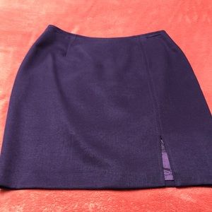 Mini skirt NWOT  size 4 ,dark midnight navy color , with lining , gorgeous blue